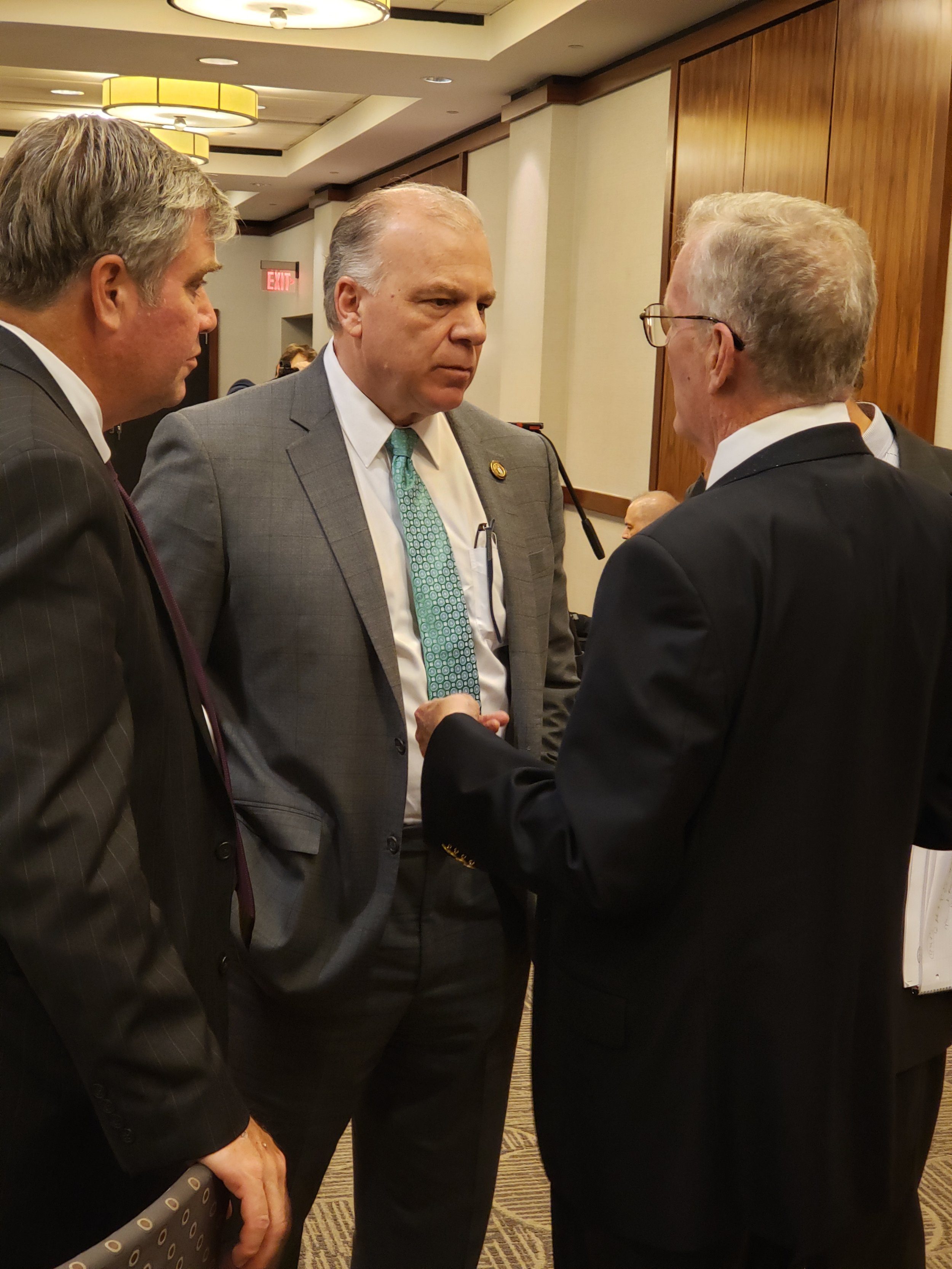 Senate President Sweeney speaks with Tom Byrne (l.) and Tom Healey (r.) co-chairs of the Pensions &amp; Benefits Study Commission